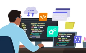 © iStock.com/elenabs
Quelle: iStock.com/elenabs Man sitting in front of a PC and coding