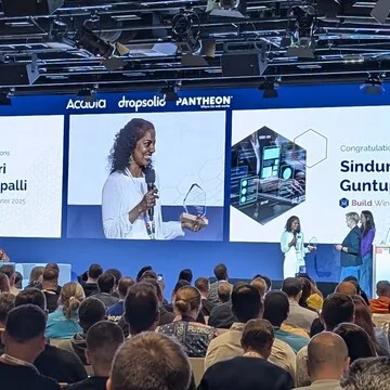 © drunomics GmbH - Source: Photographer: Wolfgang Ziegler Sinduri Guntupalli recognized in the Build Category at DrupalCon Vienna 2025 for her dedication to community organizing, advocacy, and open source work.